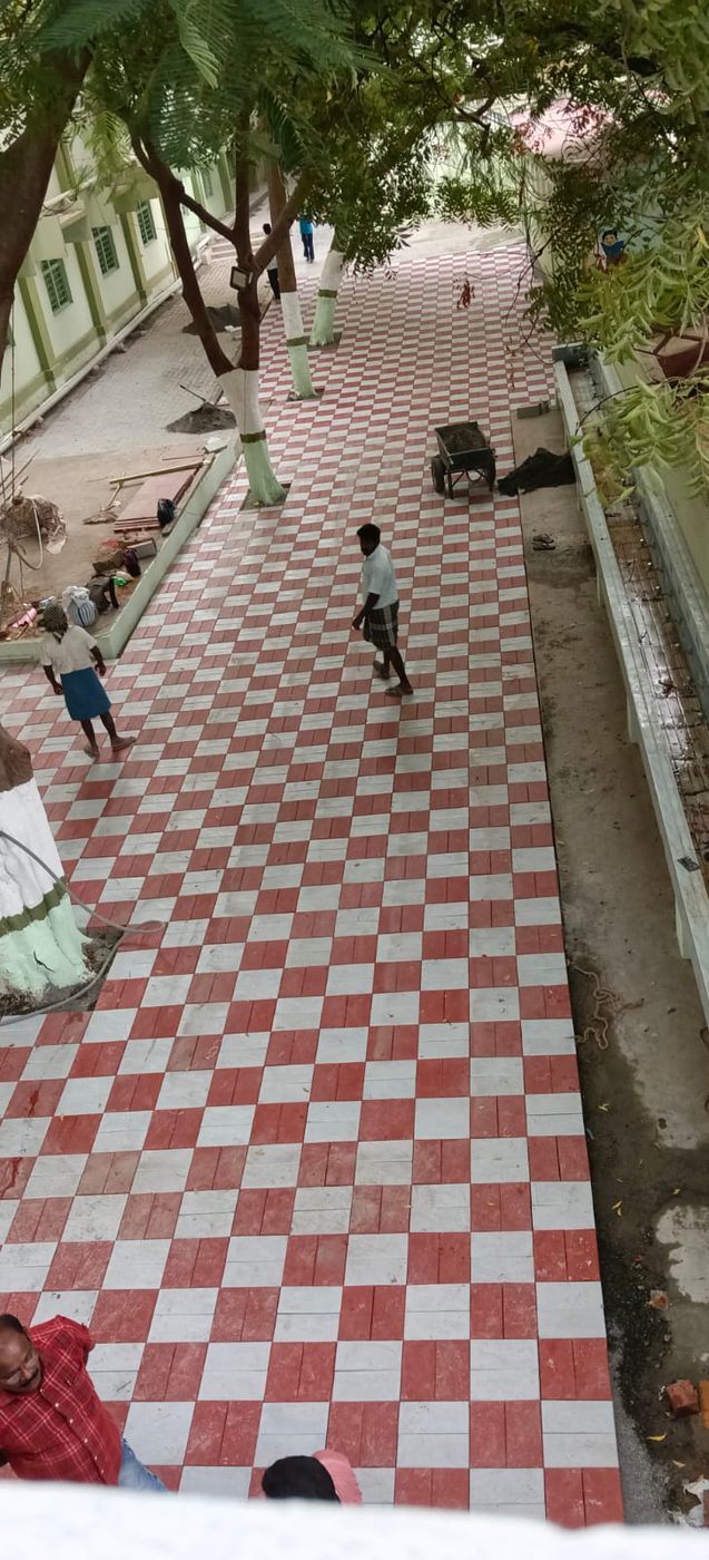 Pathway with red and white chequer tiles