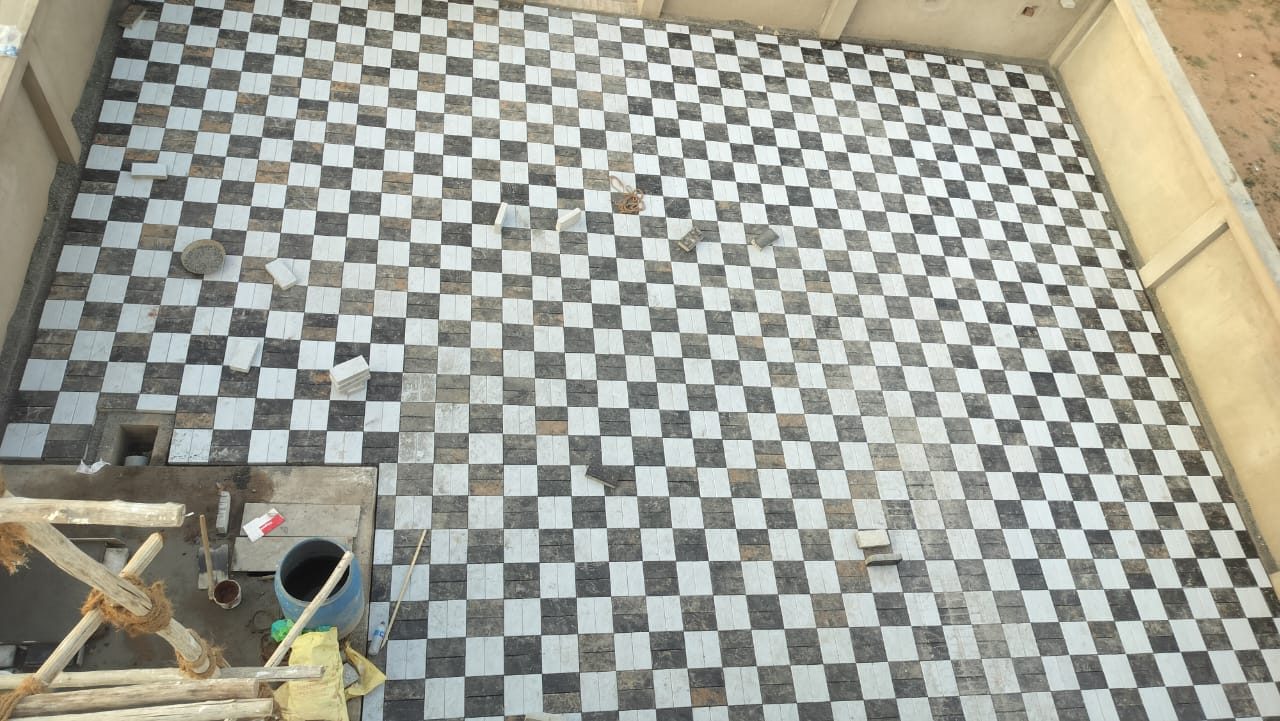 Courtyard with black and white chequer tiles